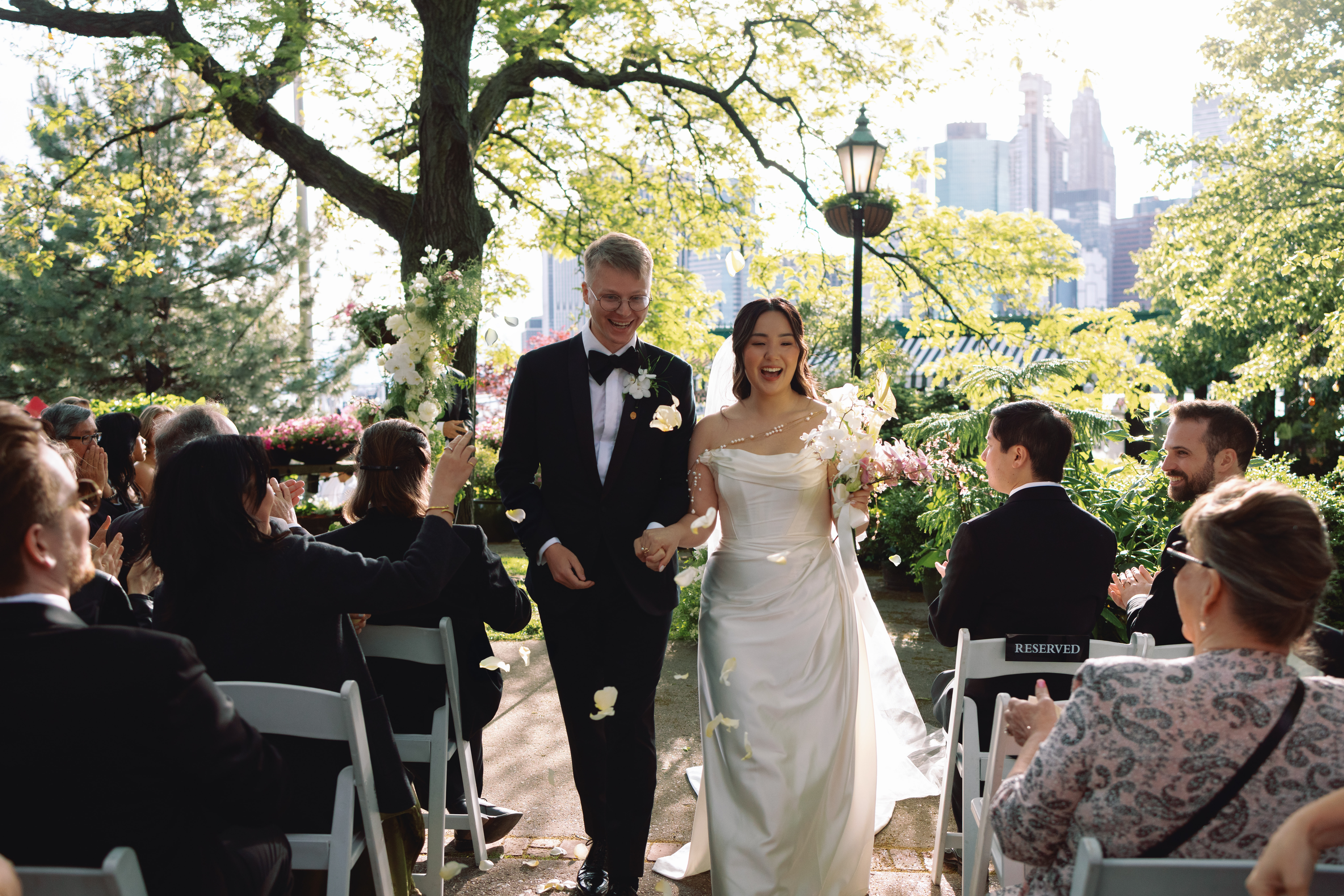 Ceremony setup at The River Café overlooking the water and skyline