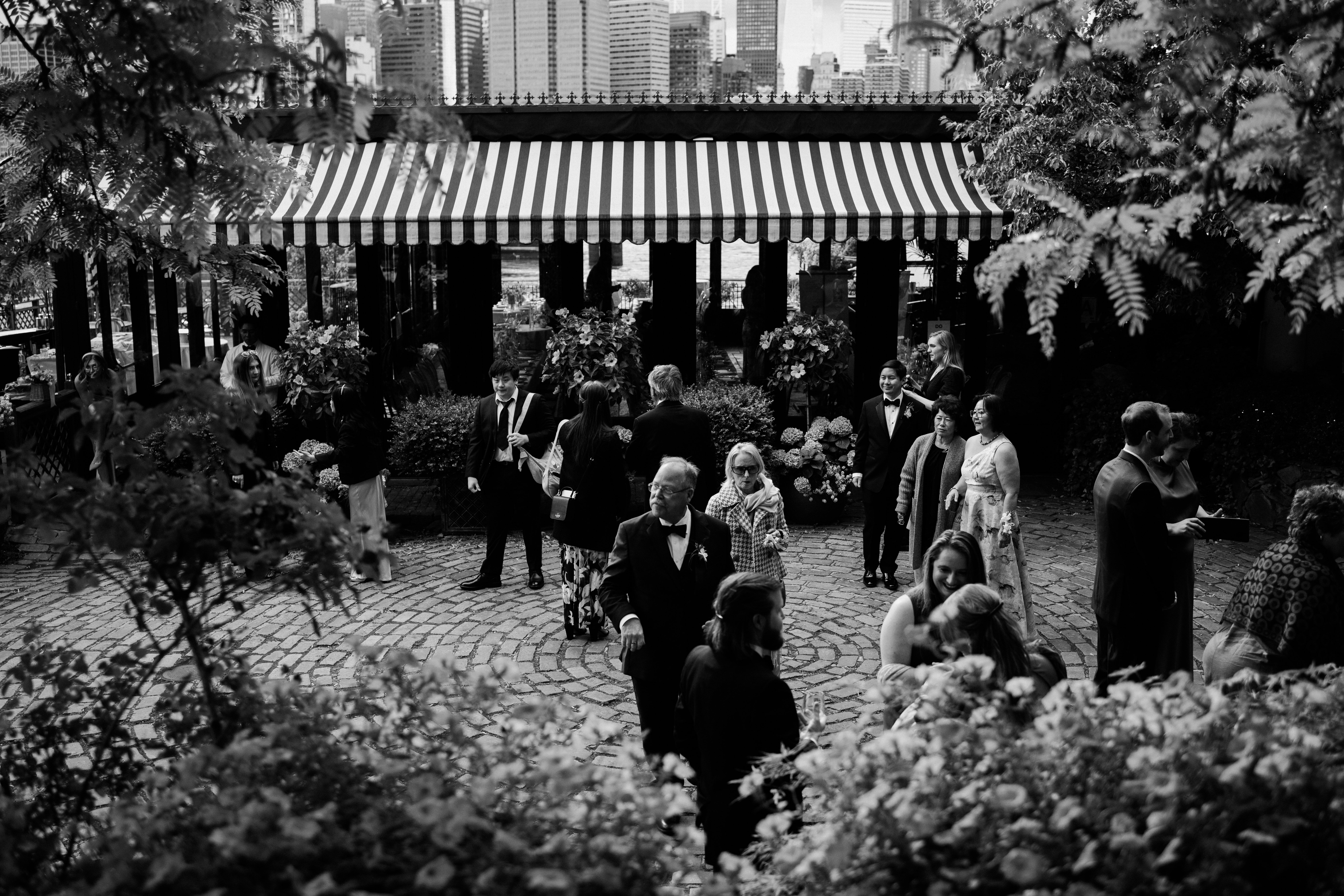 Ceremony setup at The River Café overlooking the water and skyline