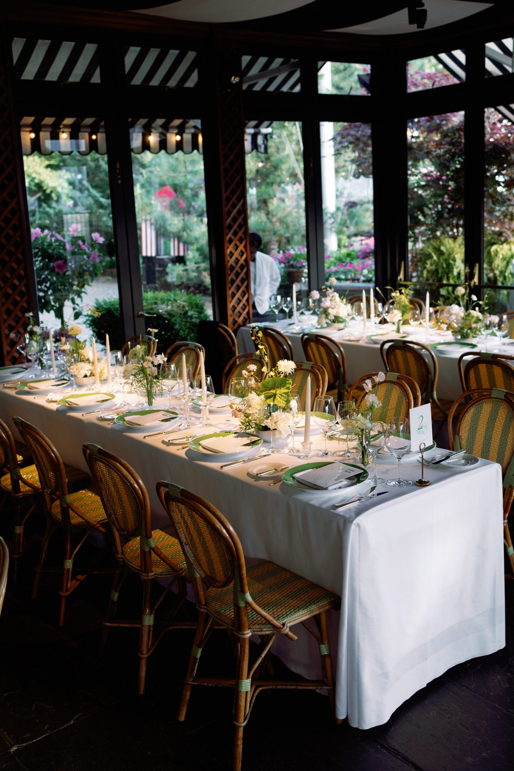 Intimate reception dinner with candlelight and floral arrangements