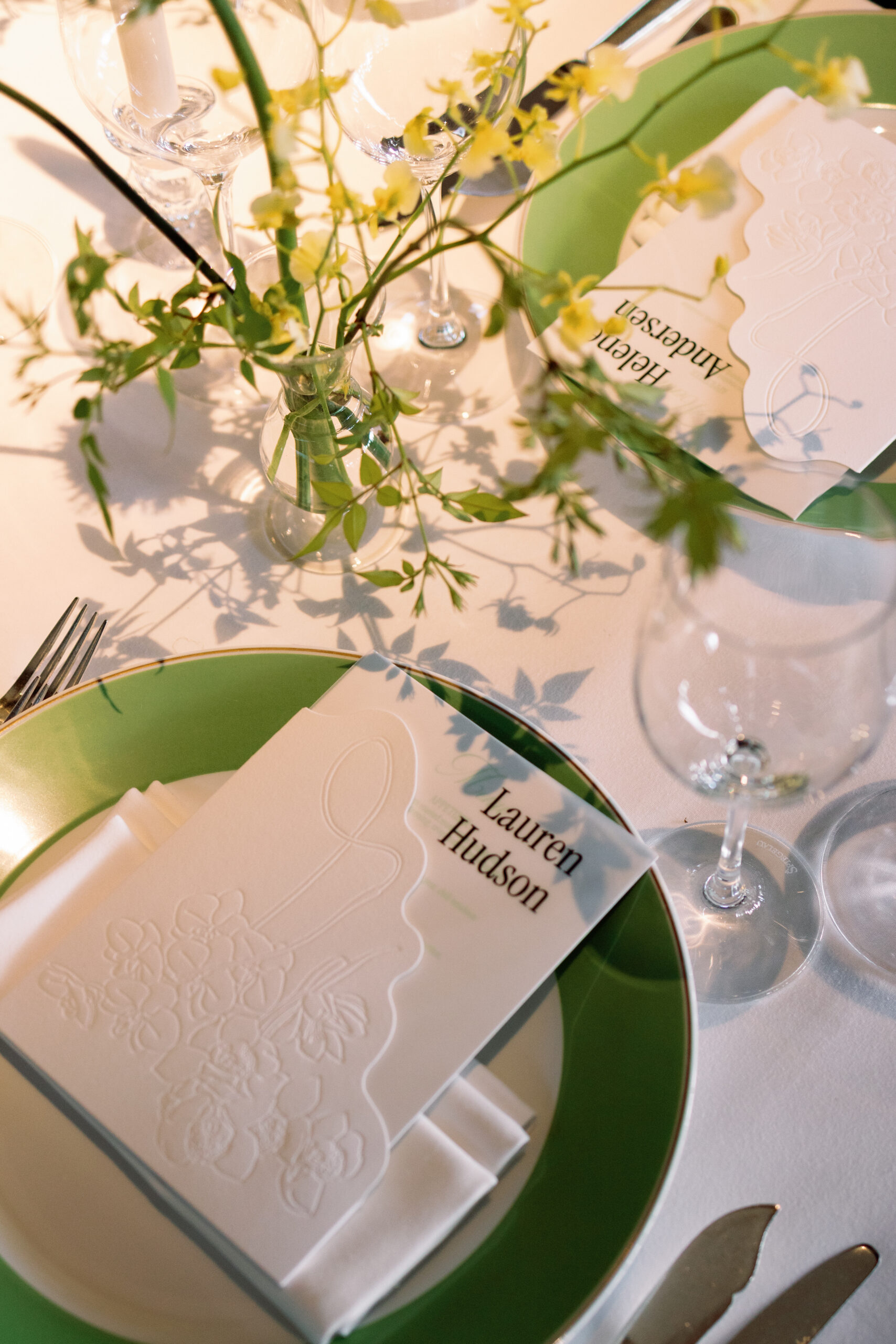 Intimate reception dinner with candlelight and floral arrangements