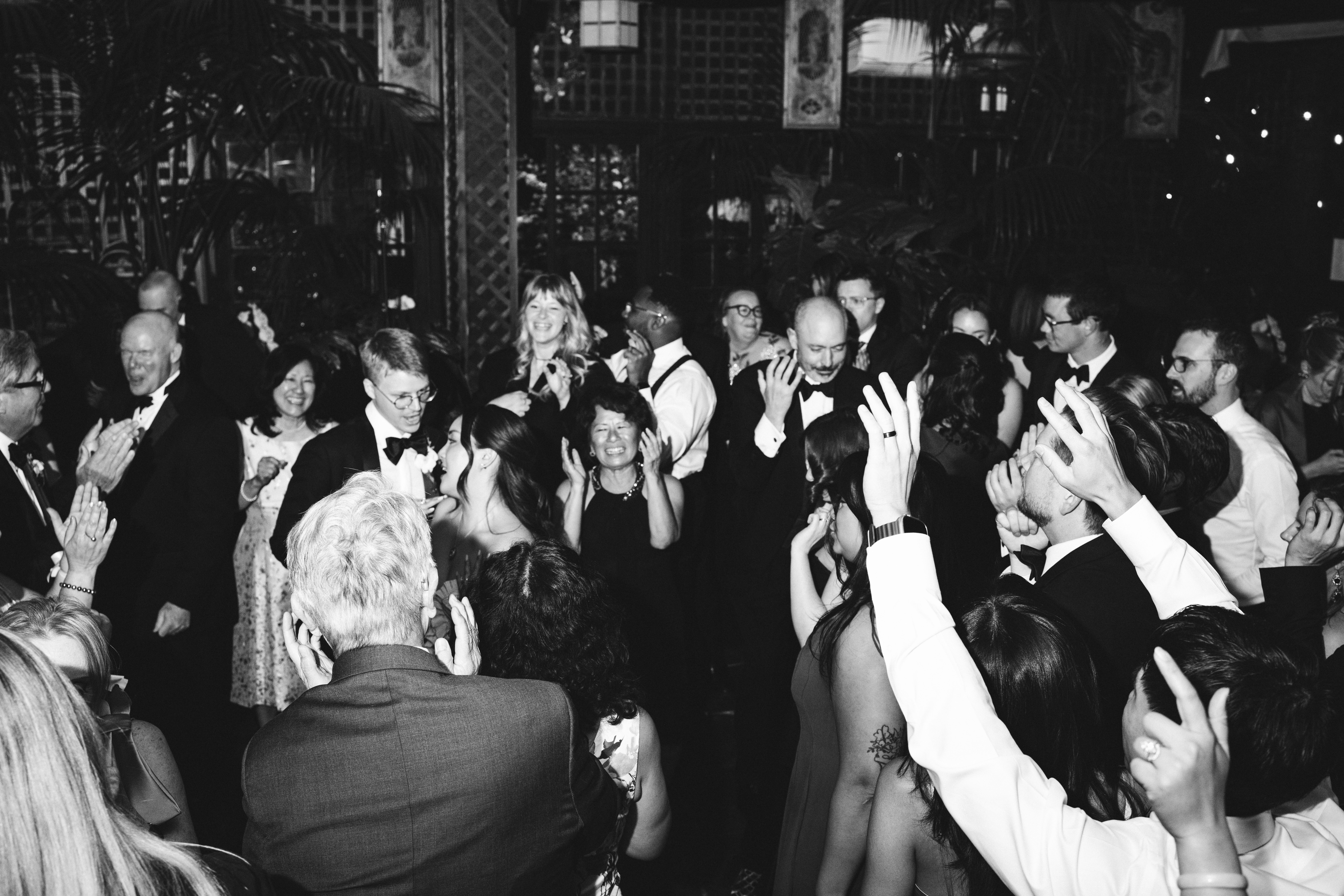 Dance floor moments with skyline glowing in the background