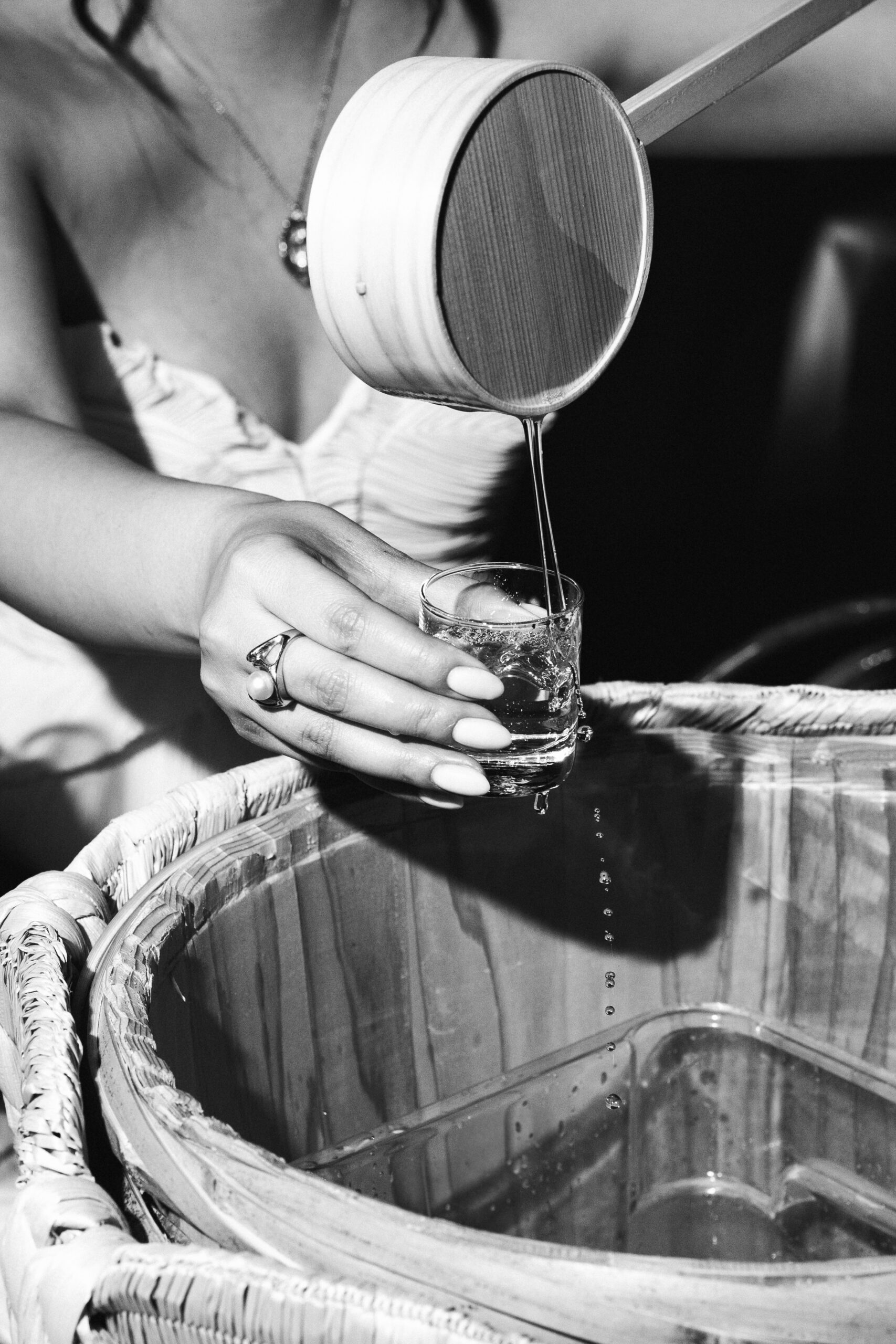 Guests raising sake glasses in celebration