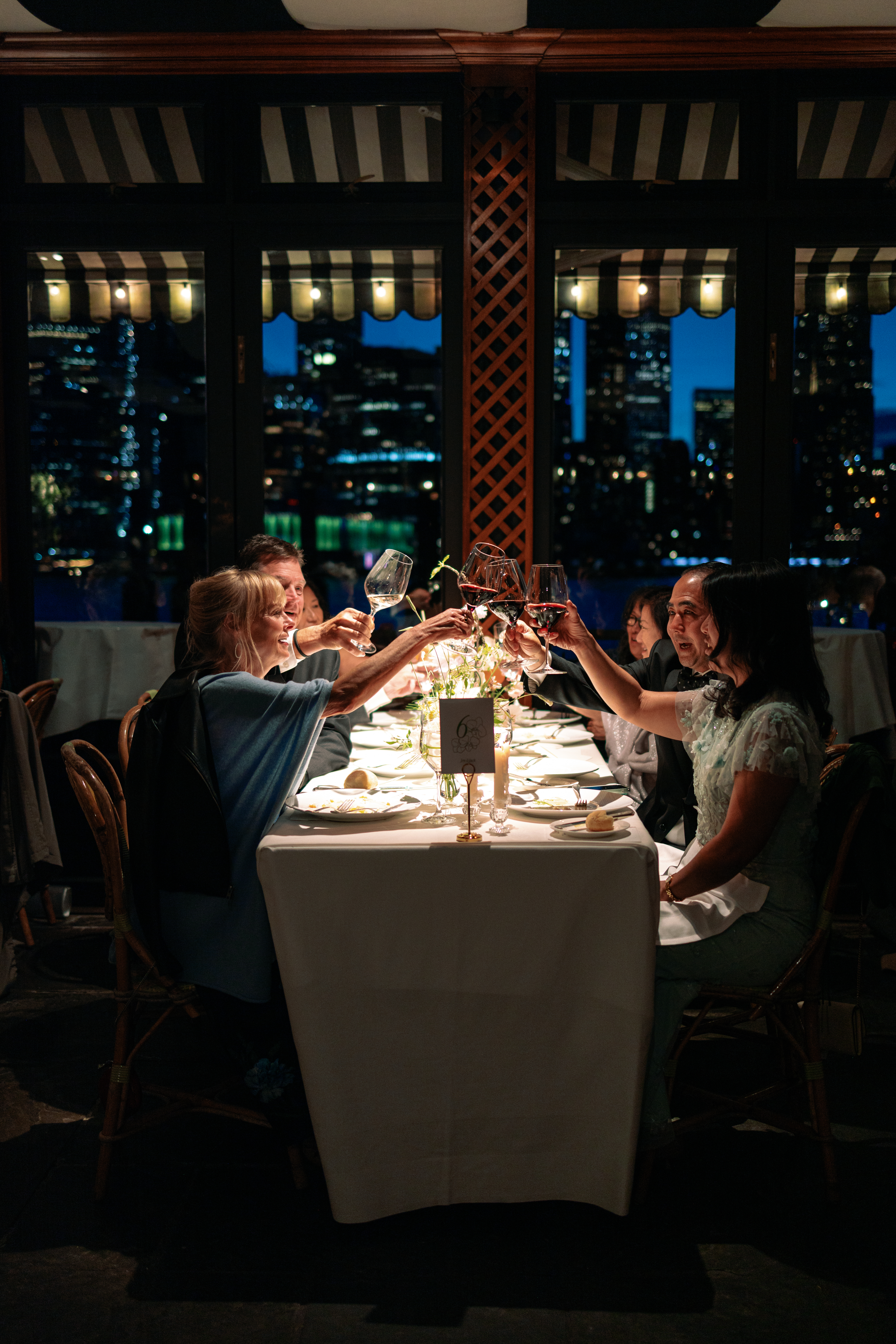 The River Café in Brooklyn candid reception moments with Manhattan skyline views