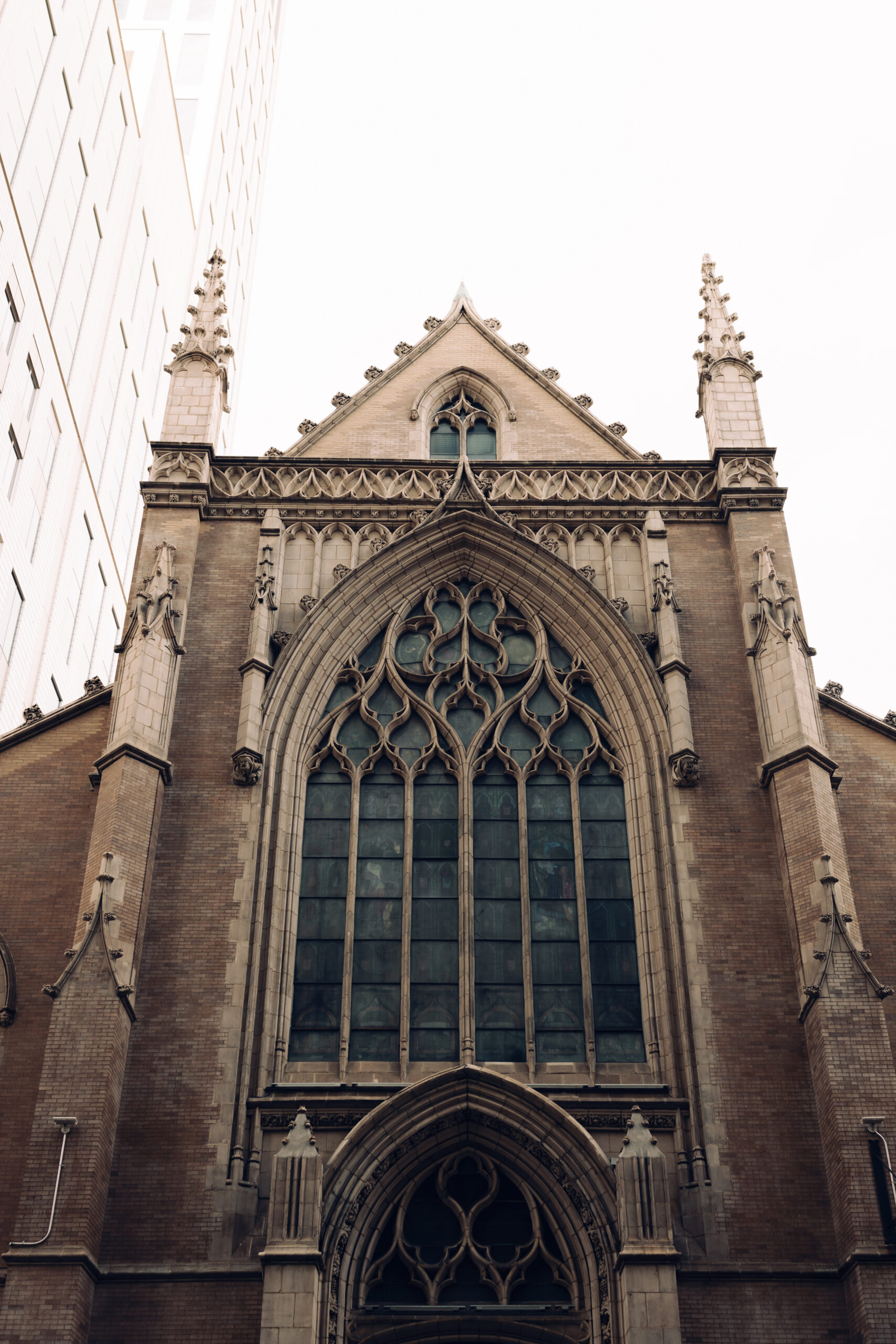 before the bride steps out of limousine in front of the catholic church in new york city 