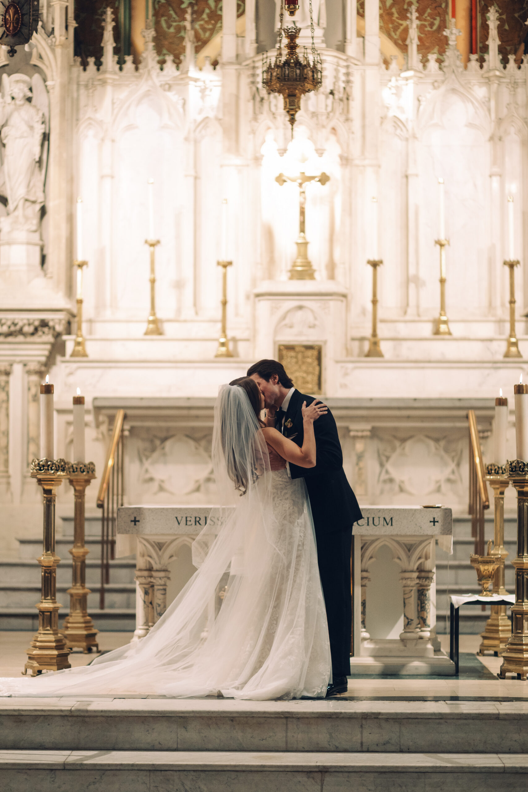 bride and groom's first kiss in new york city