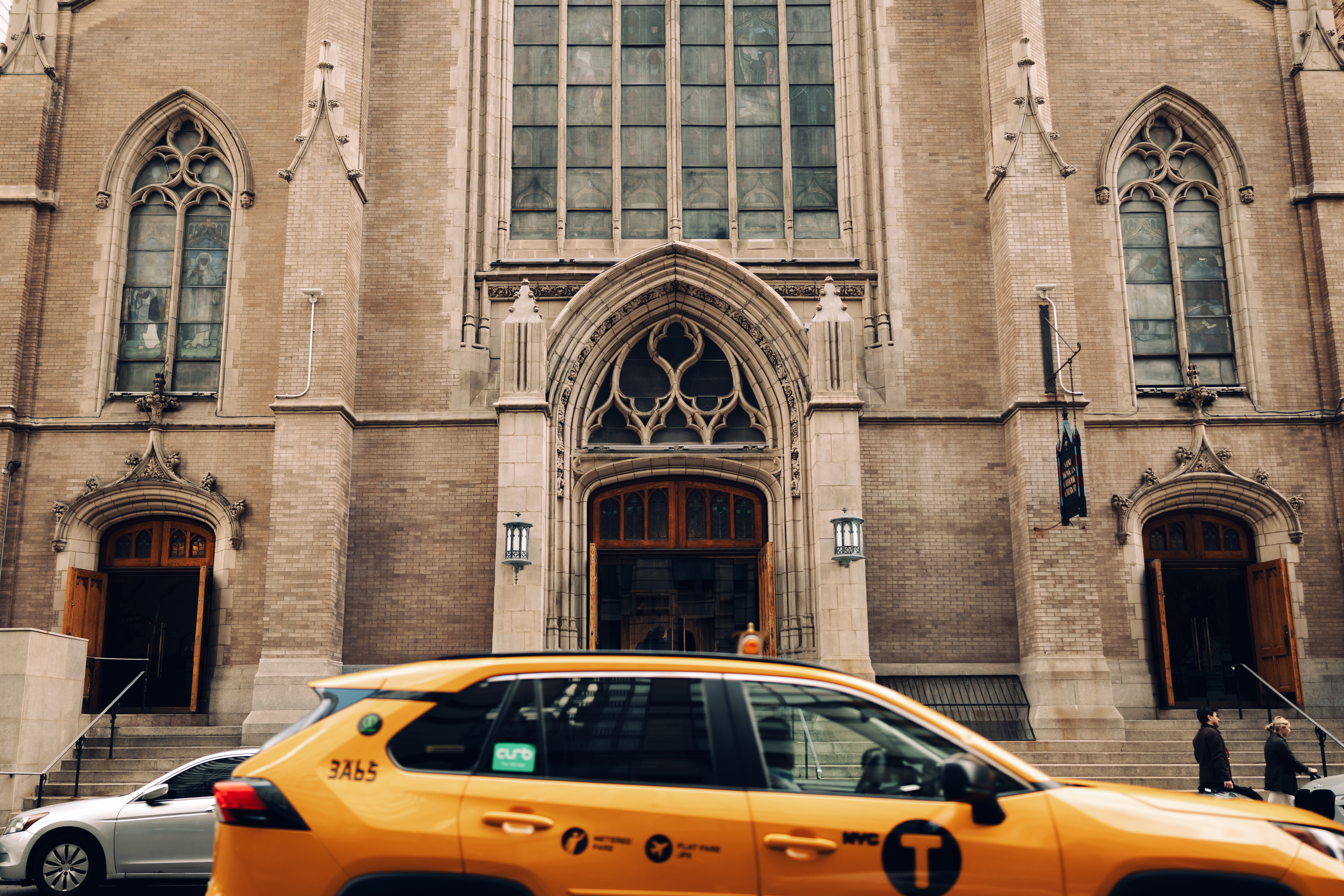 waiting for the bride to step out of limousine in an editorial-style opening moment