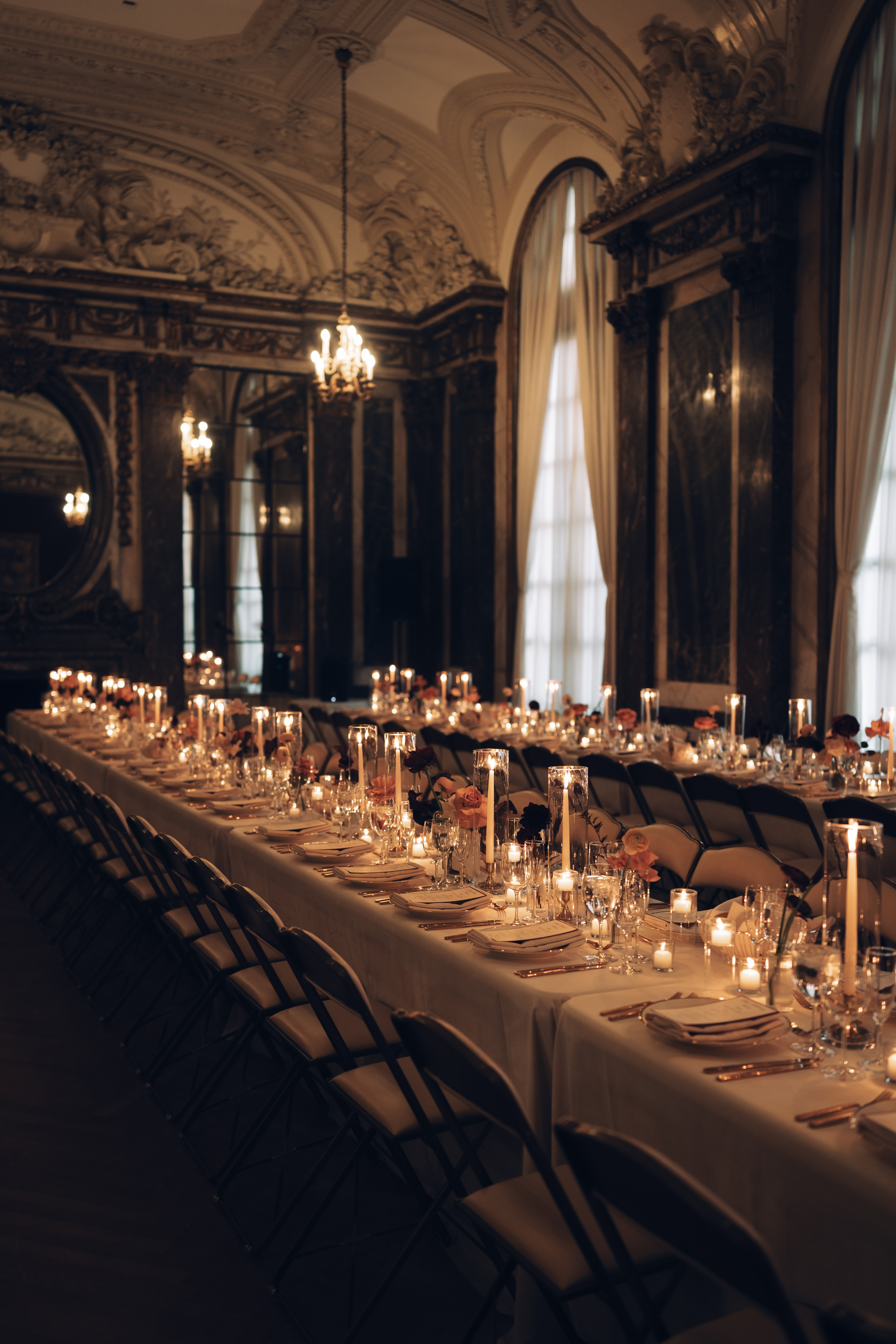 Candlelit dinner reception inside historic New York City mansion