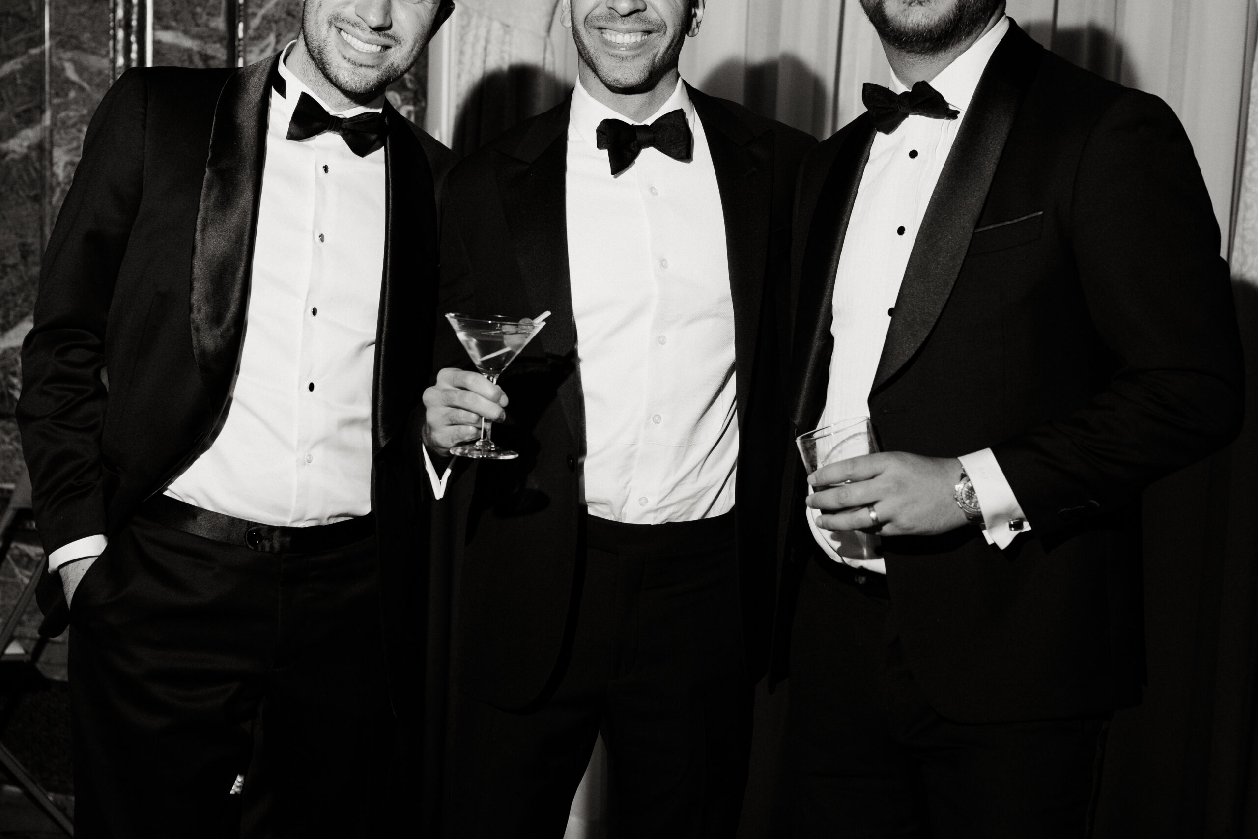 tuxedo moments with guests celebrating in historic mansion rooms