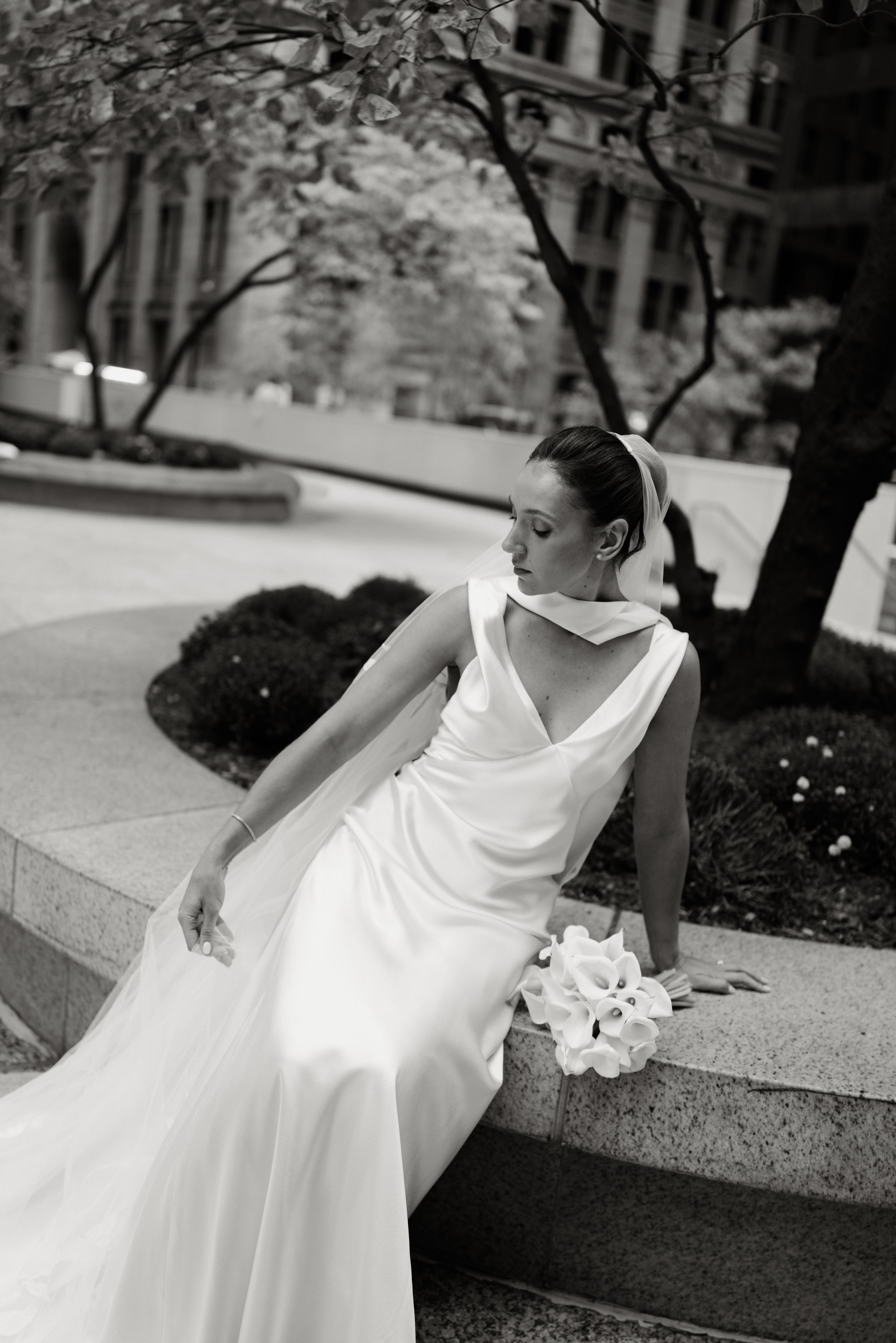 Newlyweds walking through Manhattan streets for editorial wedding portraits