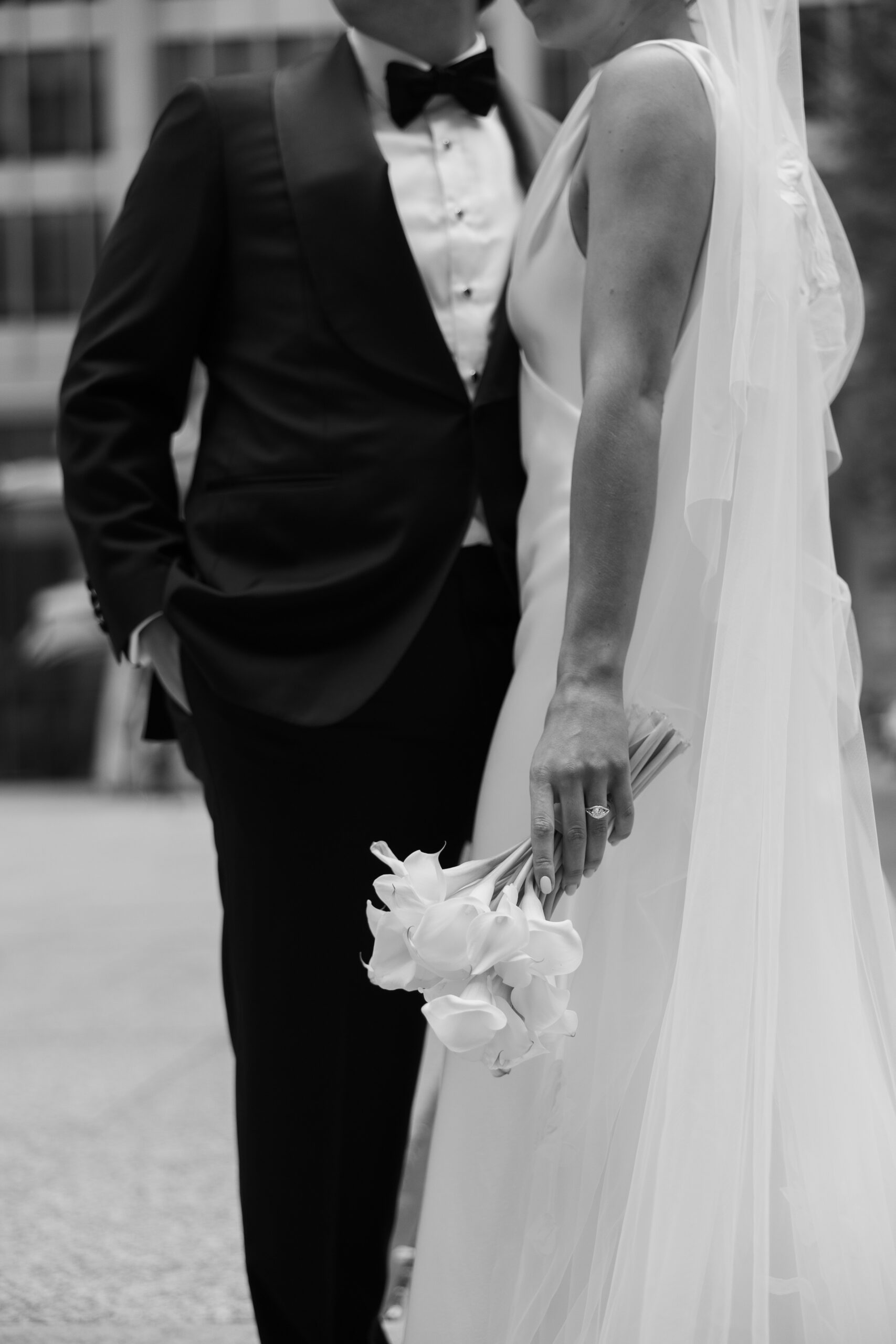 Newlyweds walking through Manhattan streets for editorial wedding portraits