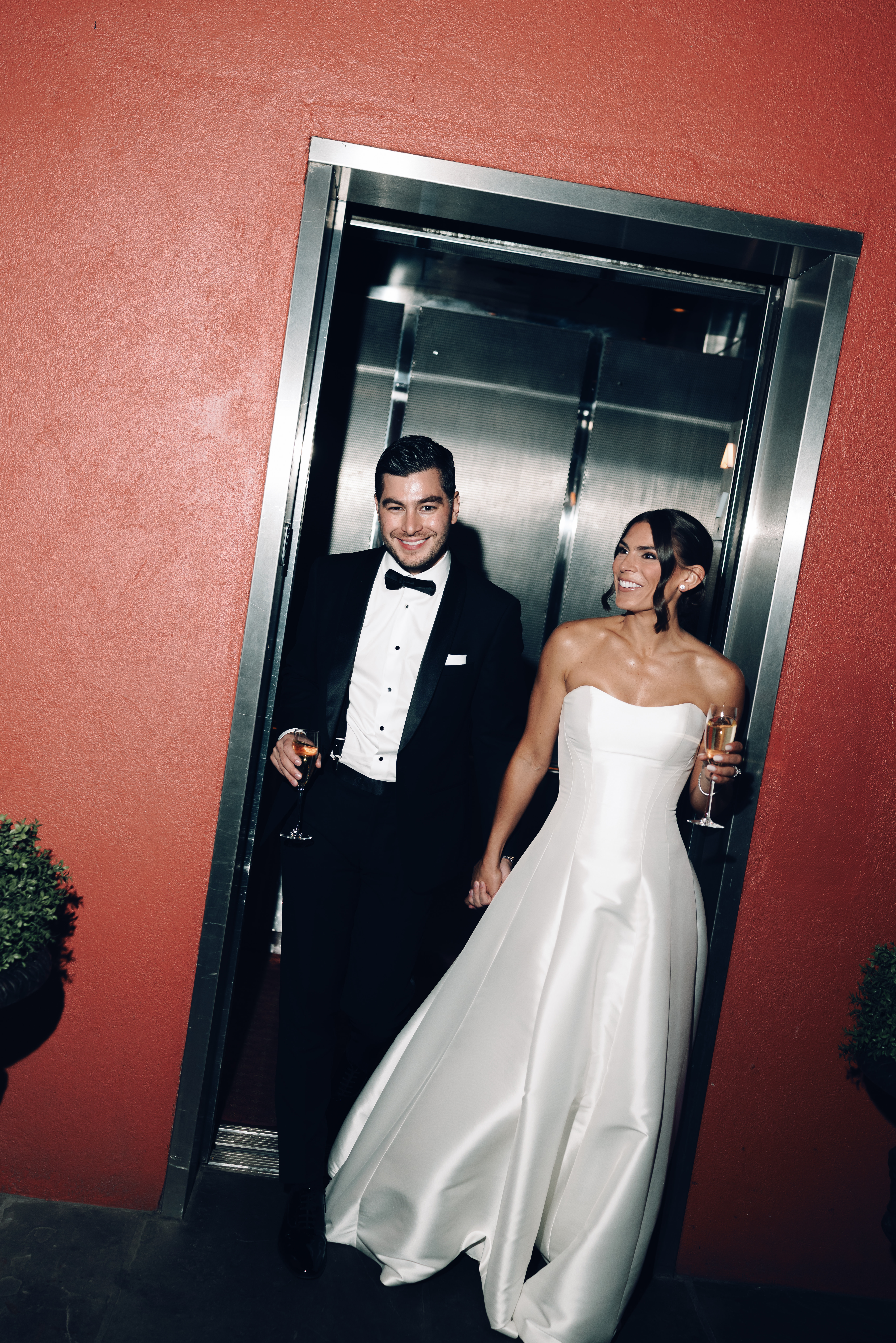 Candlelit reception tables glowing with romantic ambiance