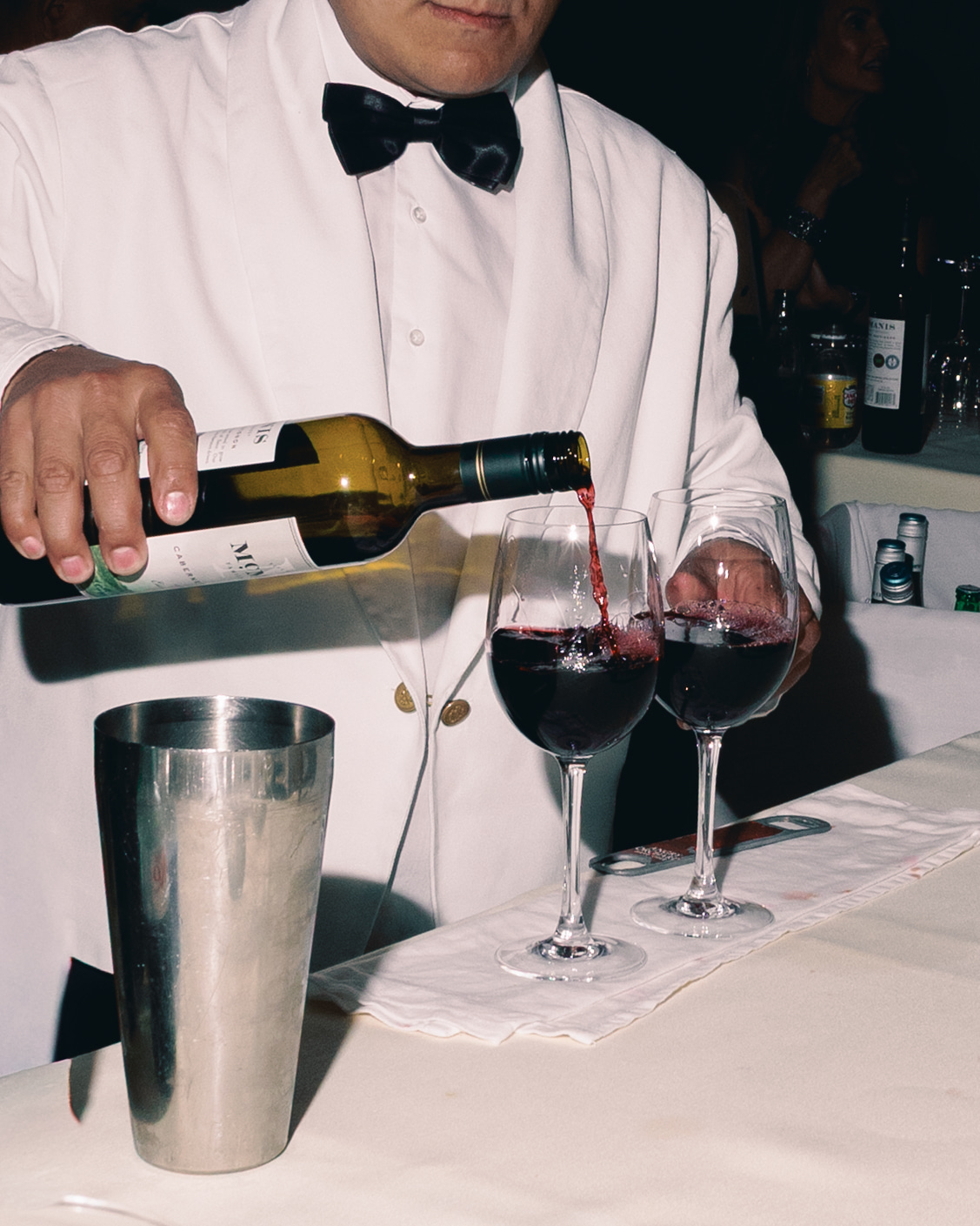 Candlelit reception tables glowing with romantic ambiance