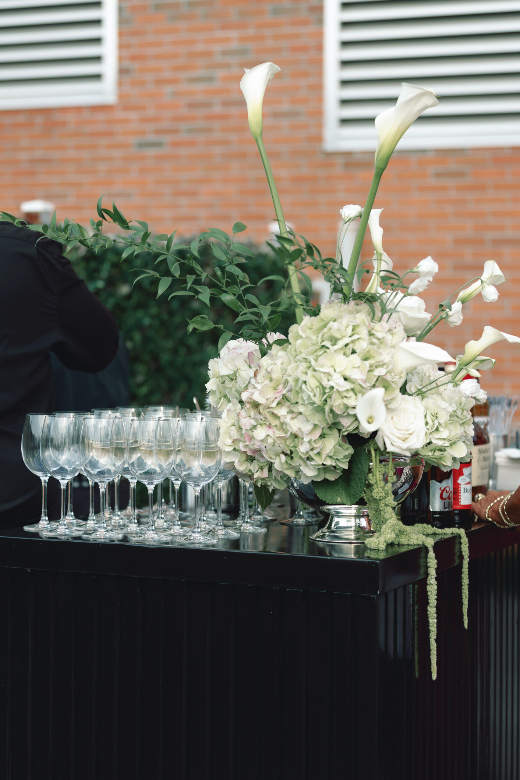 Calla lily floral arrangements in modern sculptural style for wedding reception