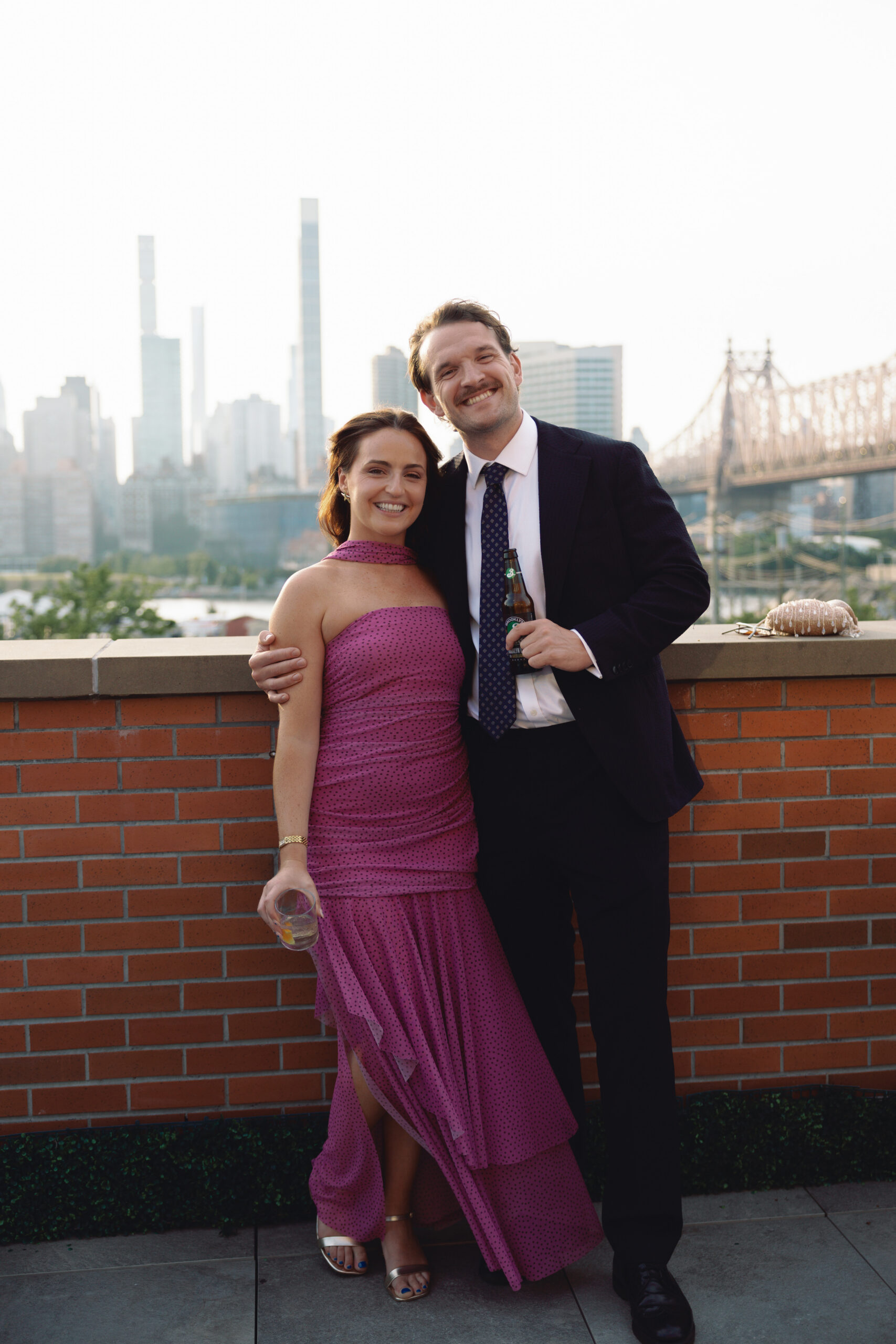 Guests in classic black tie attire with modern fashion elements