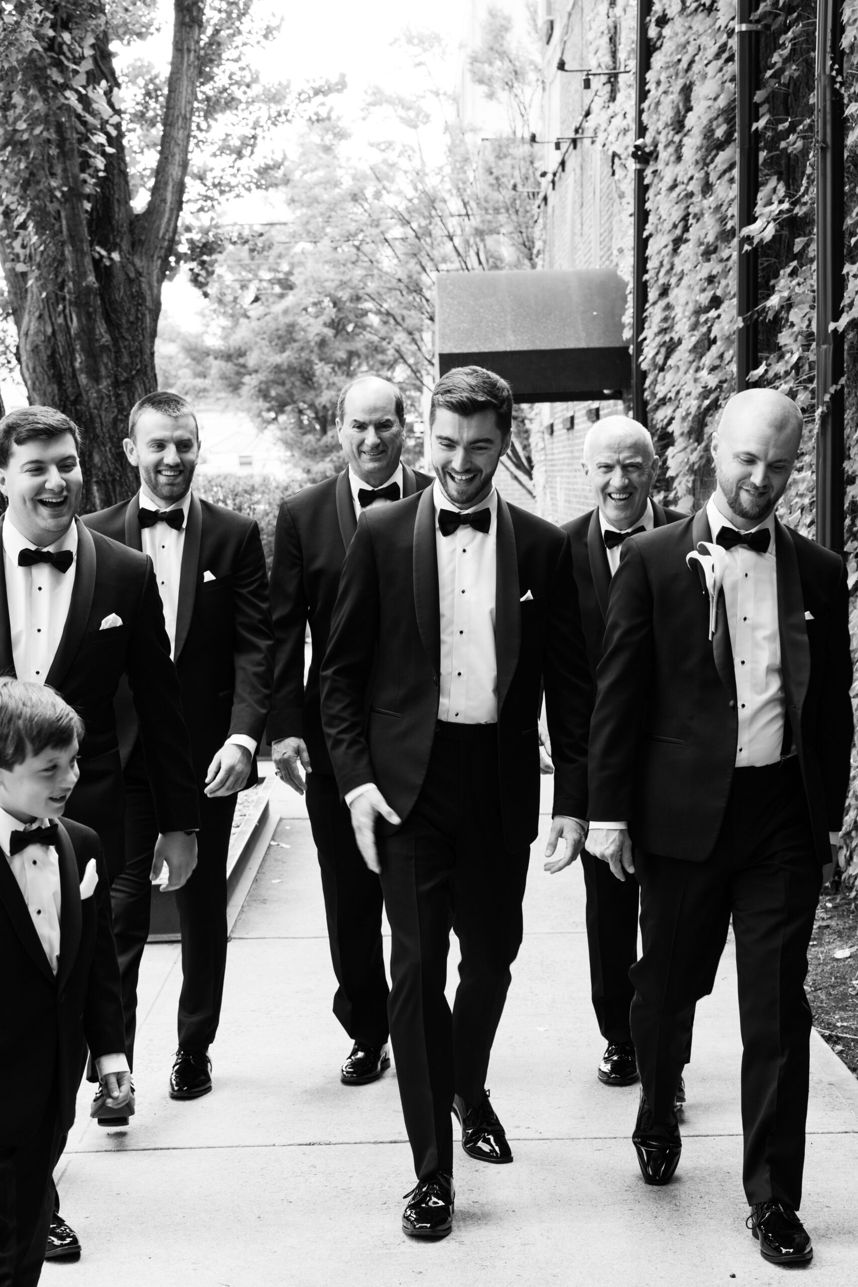 groomsman in classic black tie attire