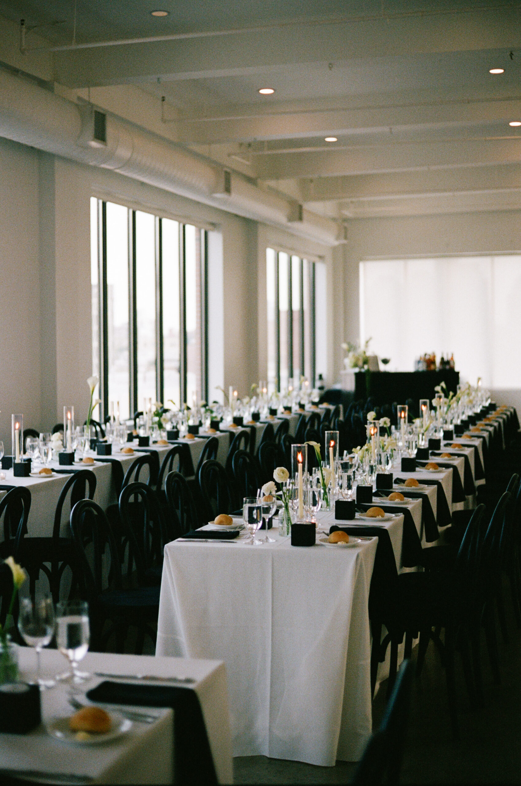 classic reception table details at The Bordone in Long Island City with panoramic Manhattan skyline views