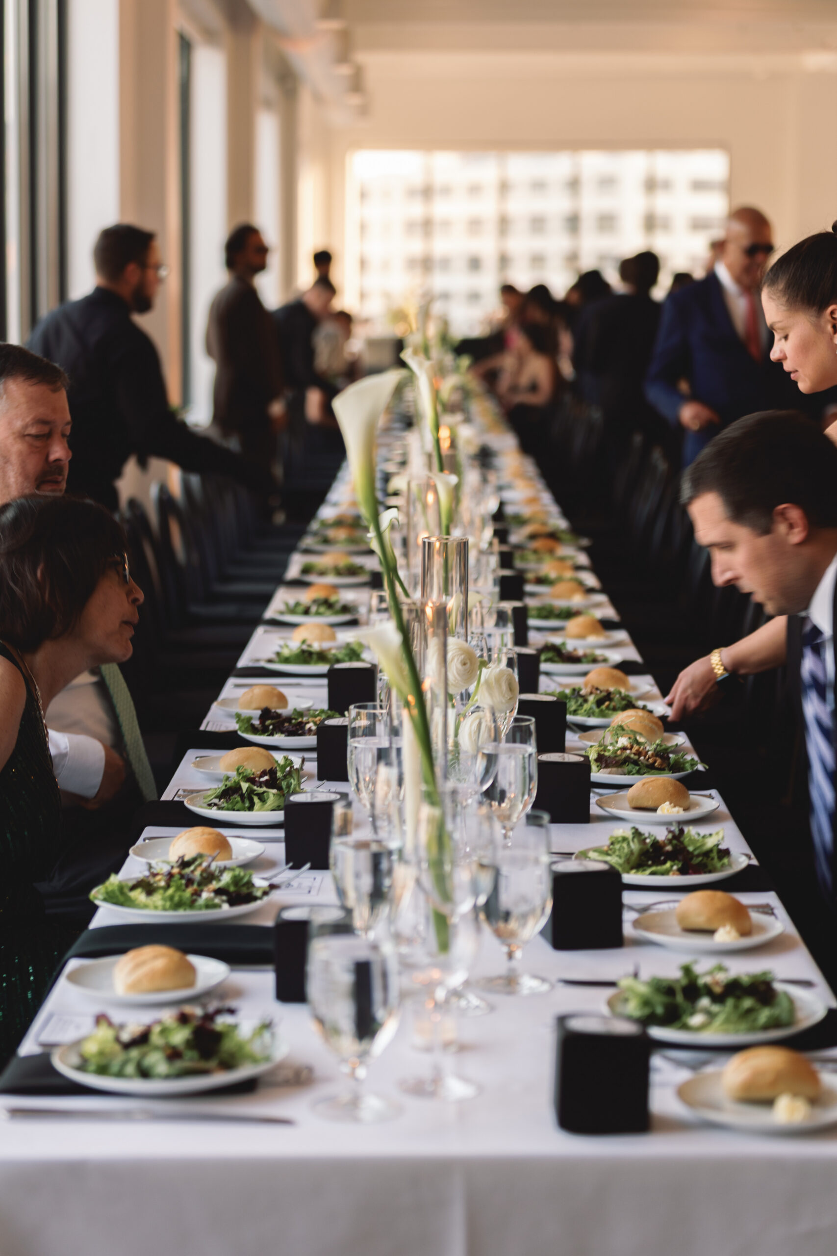 Calla lily floral arrangements in modern sculptural style for wedding reception centerpieces 