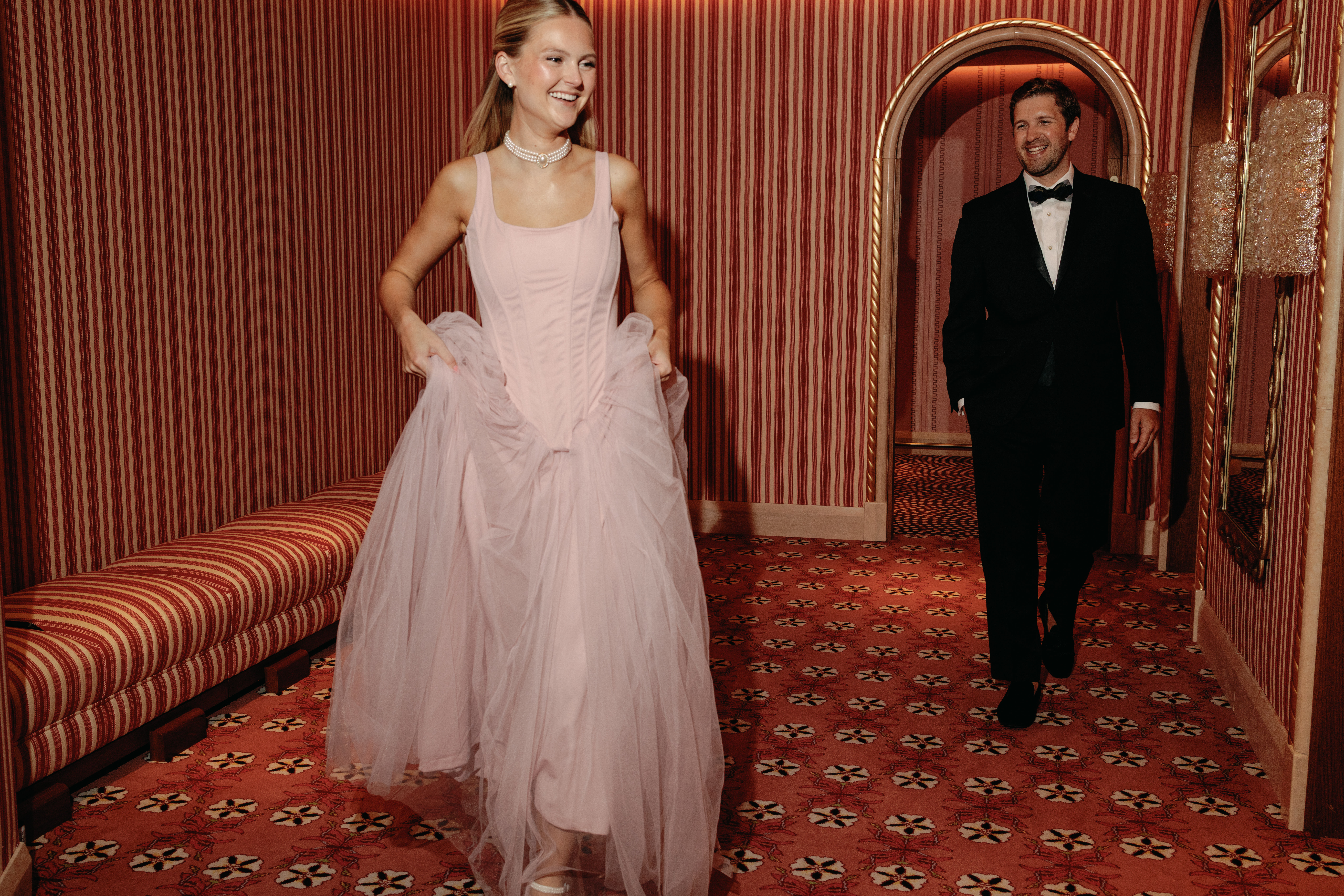 Bride-to-be in romantic engagement outfit inspired by La Vie en Rose theme