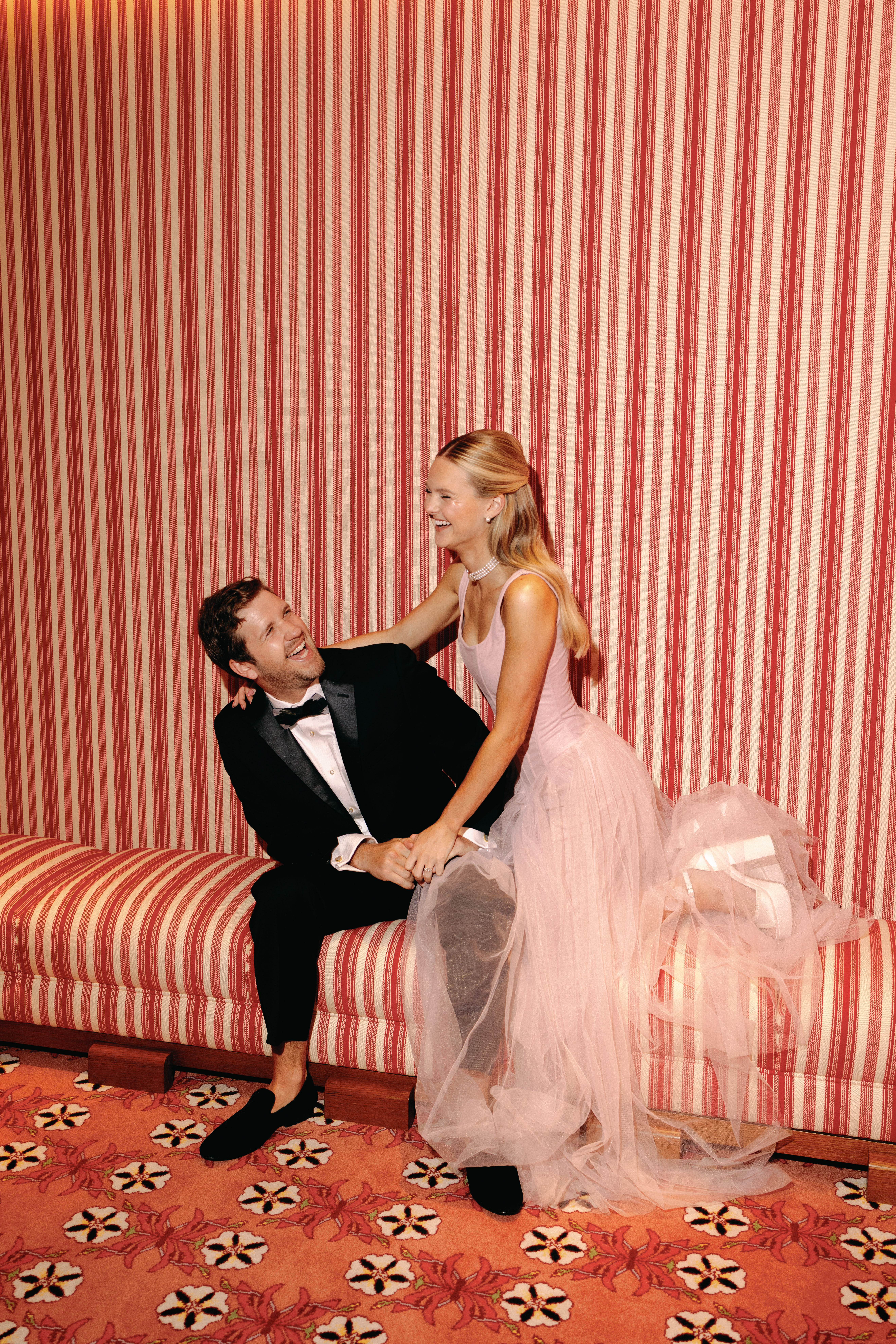 Bride-to-be in romantic engagement outfit inspired by La Vie en Rose theme