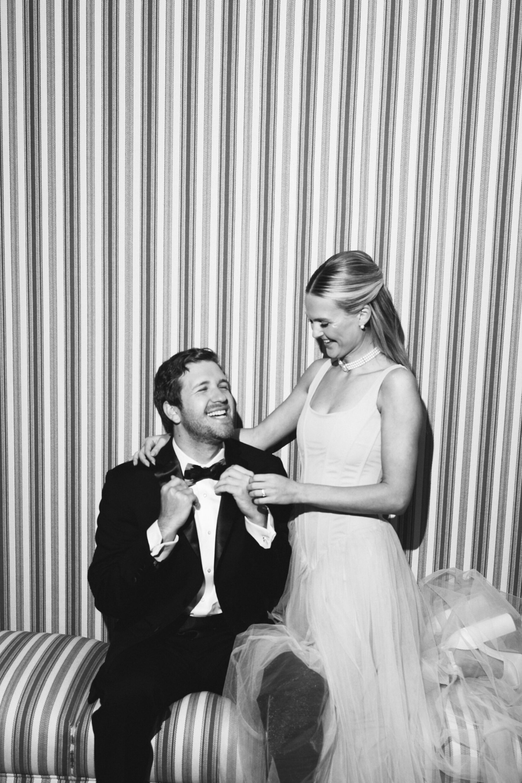 Flash-style engagement photo with movement and editorial energy