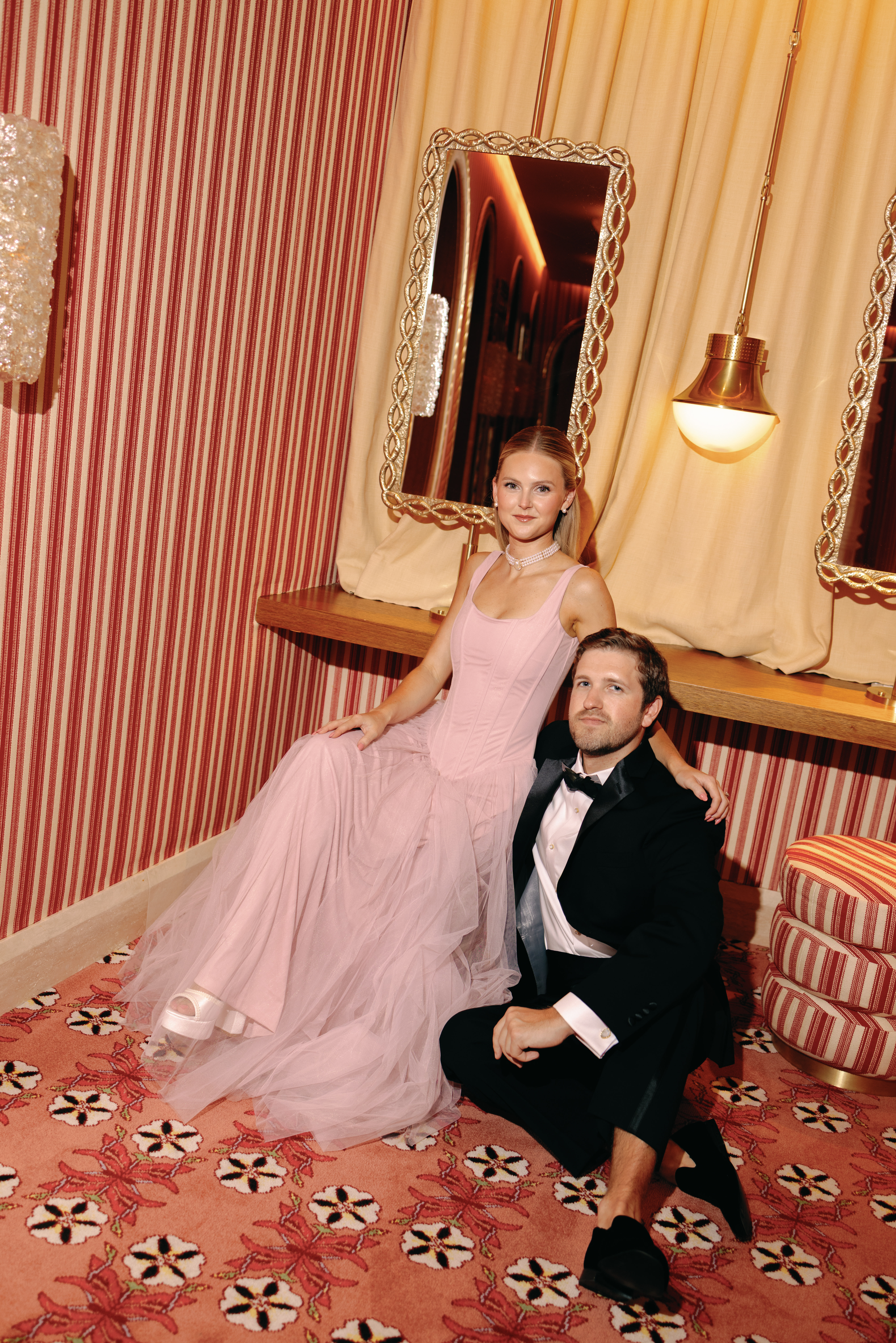 Bride-to-be in romantic engagement outfit inspired by La Vie en Rose theme