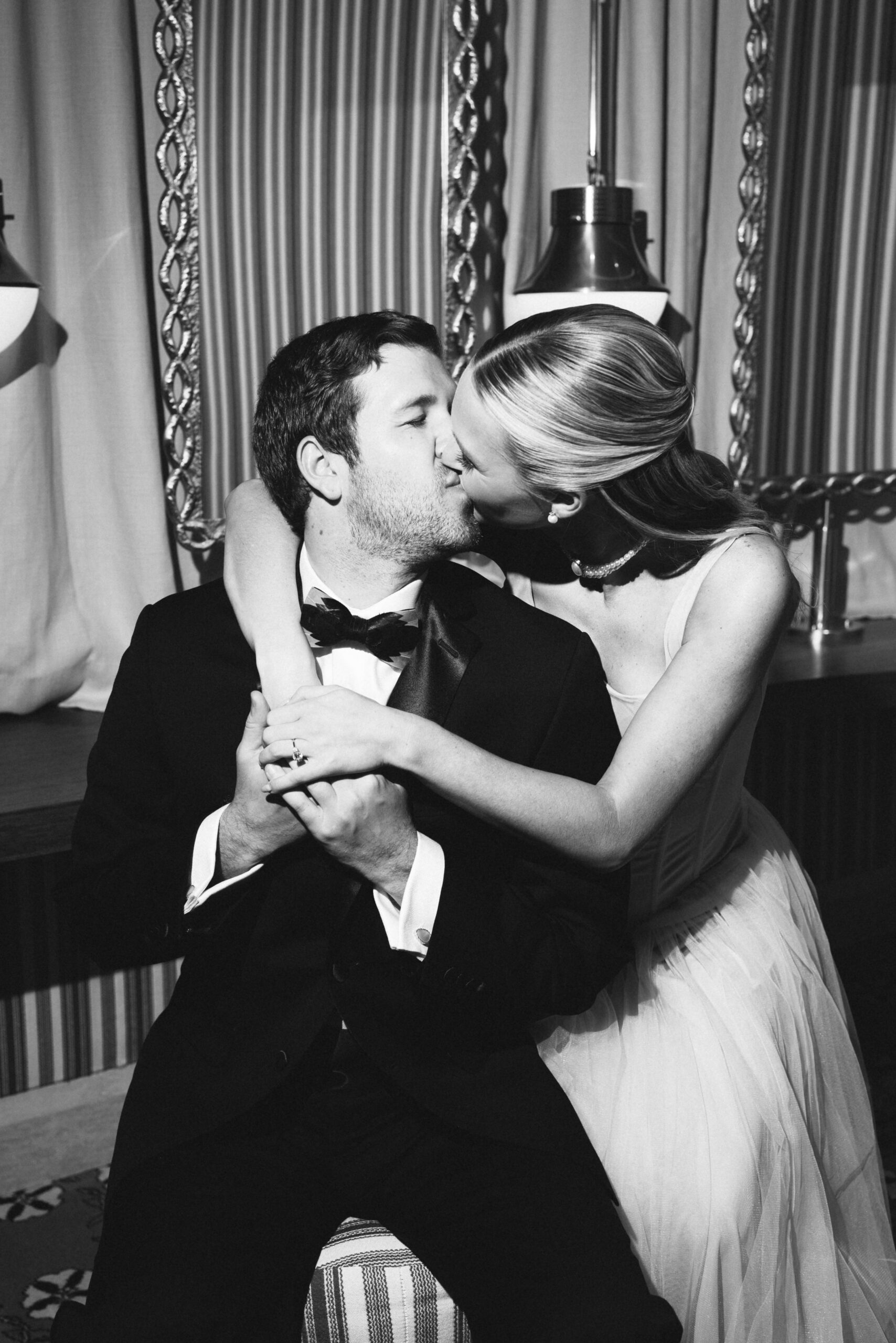 Flash-style engagement photo with movement and romantic energy