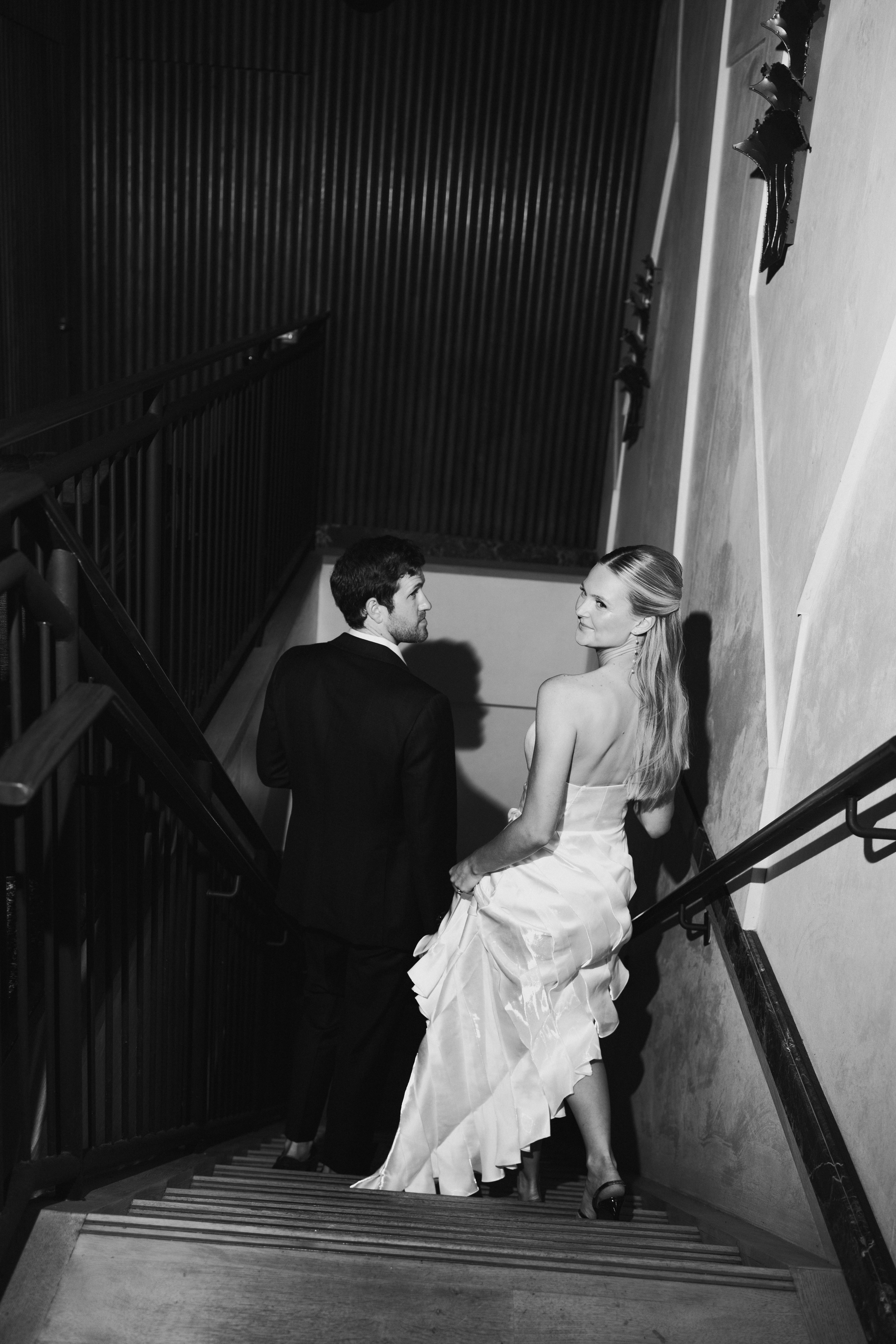 Flash-style engagement photo with movement and city energy