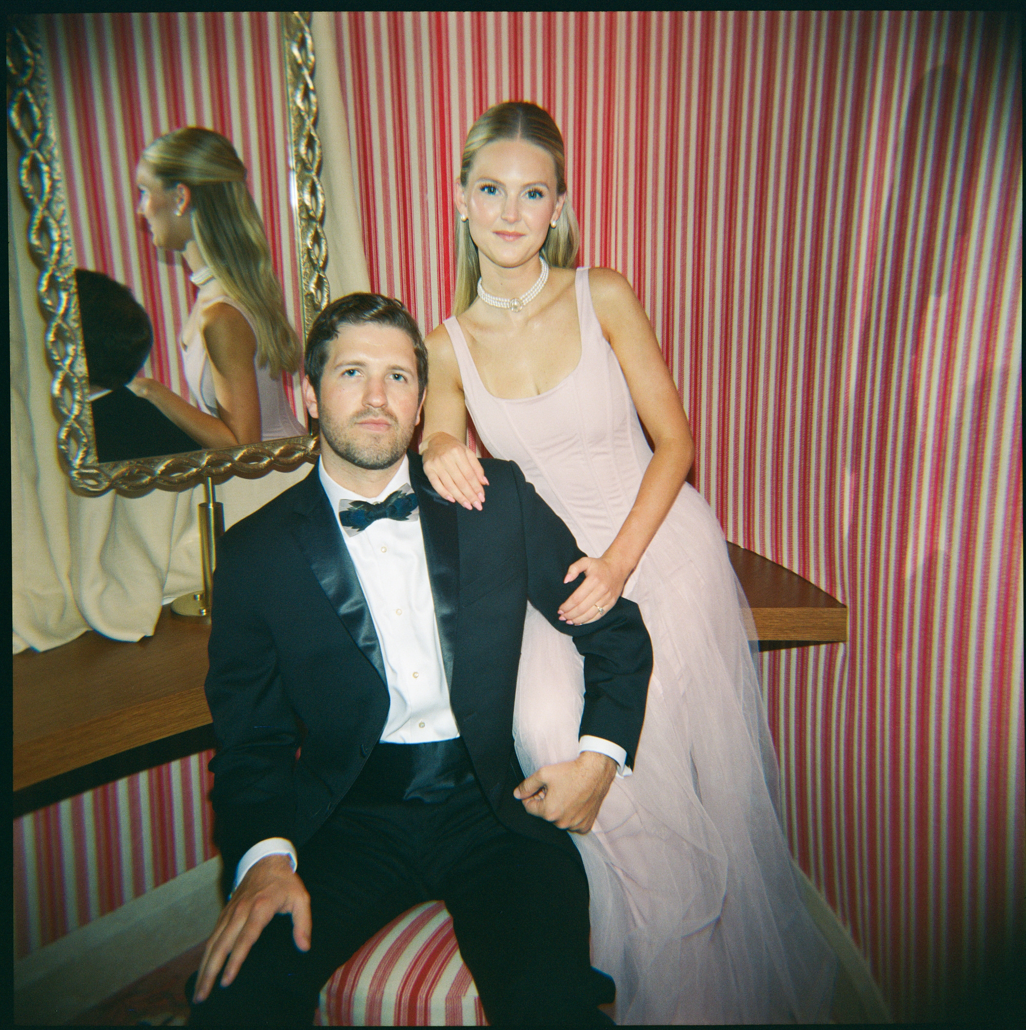 Bride-to-be in romantic engagement outfit inspired by La Vie en Rose theme